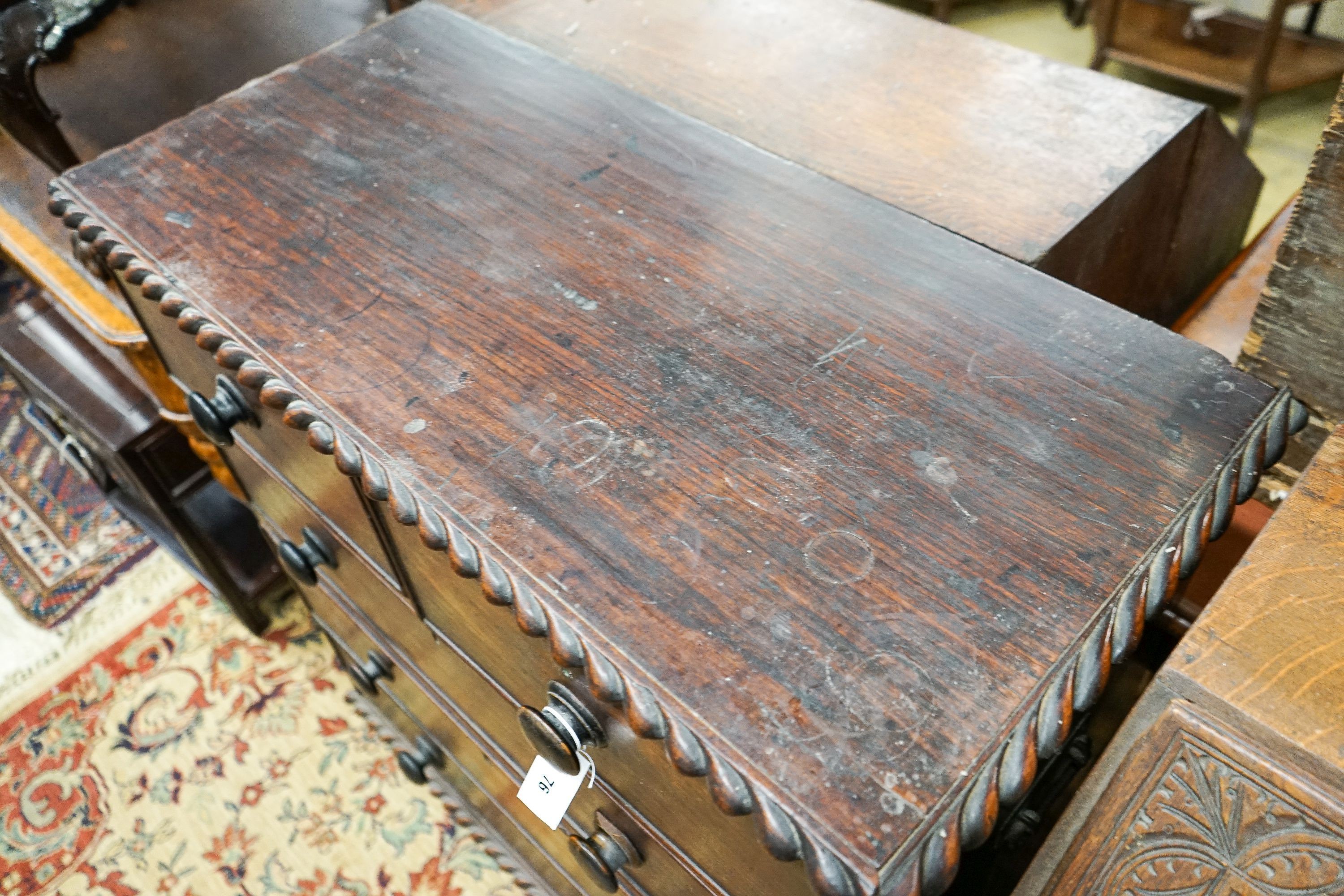 A 19th century Anglo Indian padouk two part chest with gadrooned decoration, width 96cm, depth 43cm, height 106cm